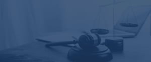 Law gavel and justice balance on a desk